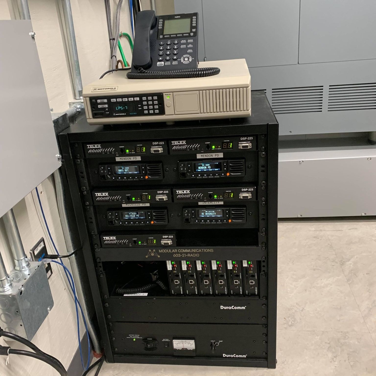 a cabinet full of radio switches